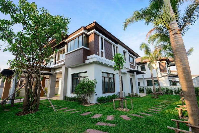A stunning luxury home surrounded by greenery. Choose our turnkey construction services in Bangalore for quality homes