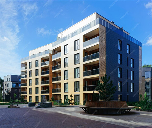 Elegant apartment complex built with high-quality home construction in Bangalore, featuring stylish balconies and design